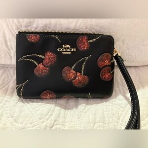 COACH Black Wristlet with Red Sequin Cherry Motif